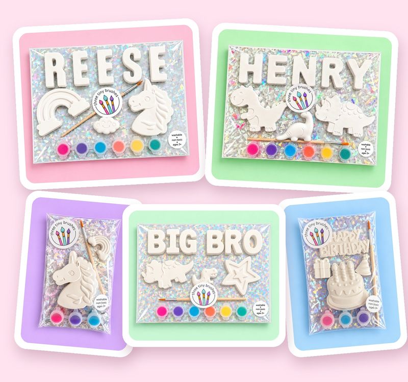 Personalized paint name kits for Reese (unicorn) and Henry (dino), a Big Bro paint kit, plus Unicorn & Rainbow and Happy Birthday party packs